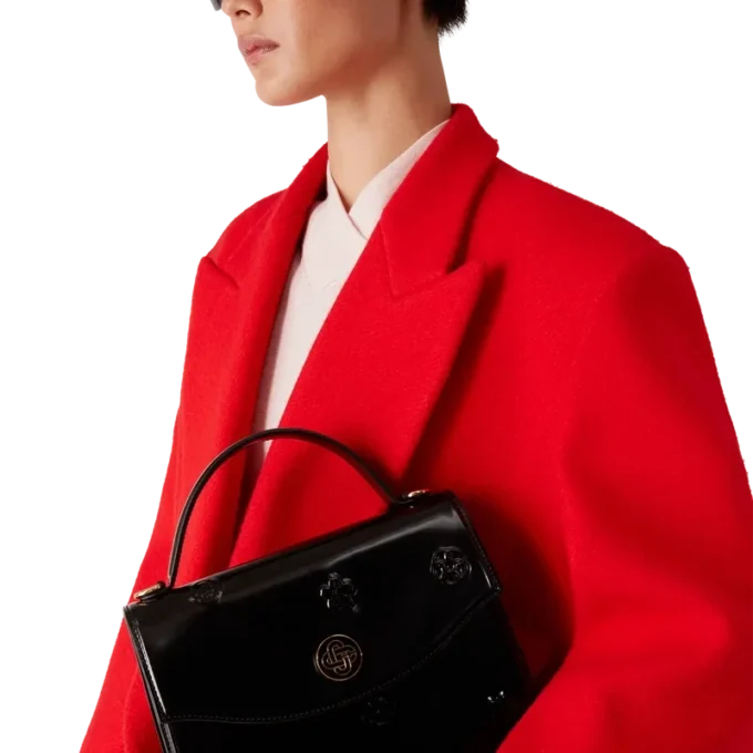 Jeanne-Tasche mit schwarzen Emblemen