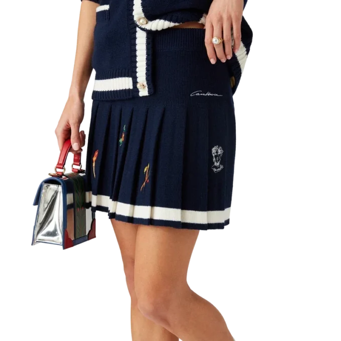 Plisseerock aus Wolle und Kaschmir mit gesticktem Motiv