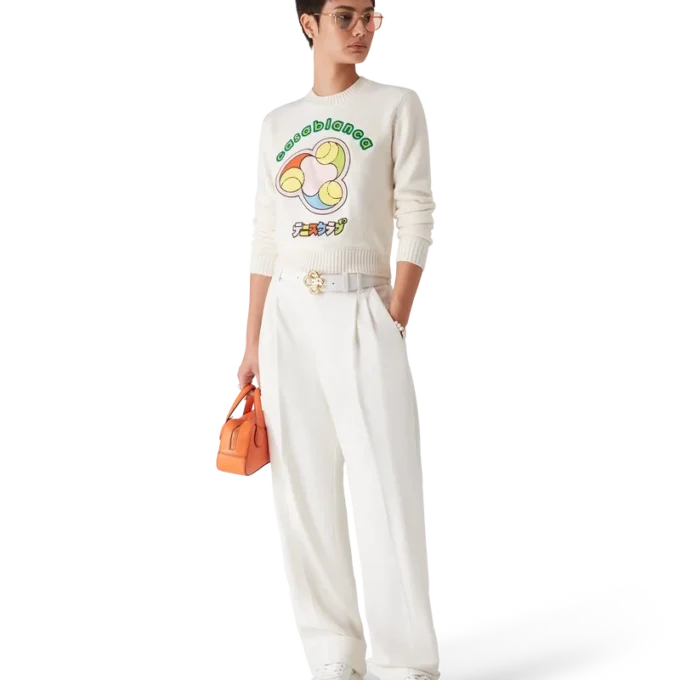 Tennisball-Merino-Strickpullover mit Rundhalsausschnitt Tennisball-Merino-Strickpullover mit Rundhalsausschnitt